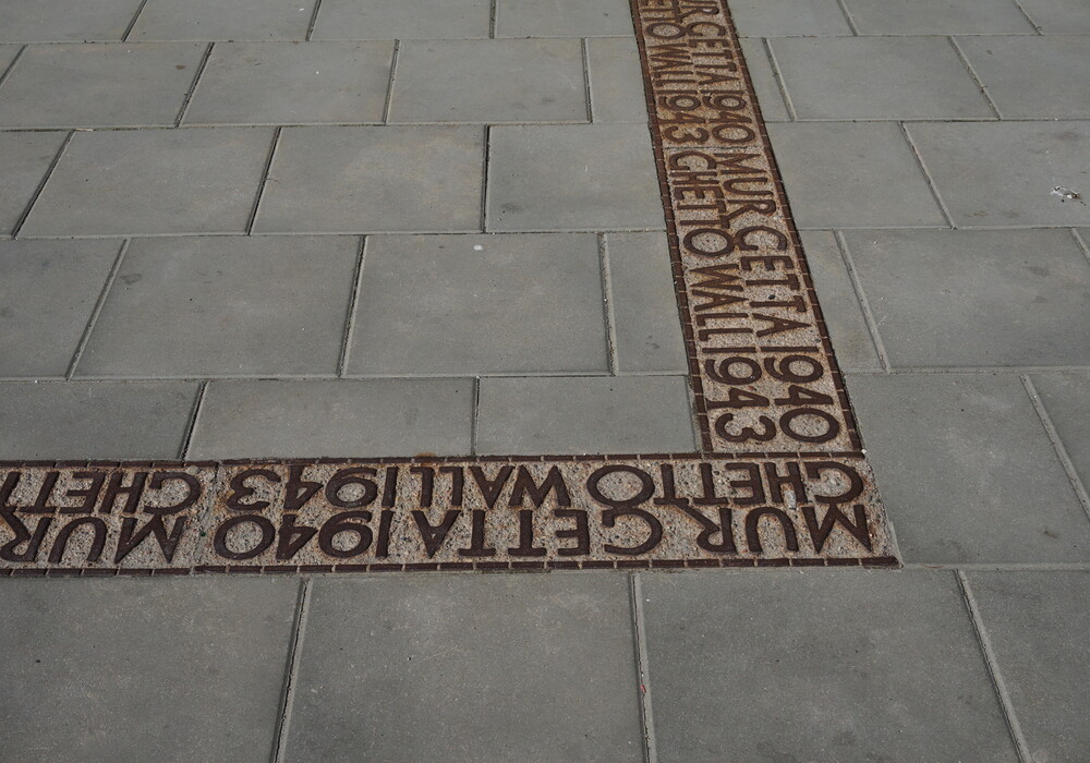 Traces of the Jewish ghetto wall in Warsaw, marked on the cobblestones in Warsaw. They marked the boundaries of the Warsaw ghetto in 1940. 