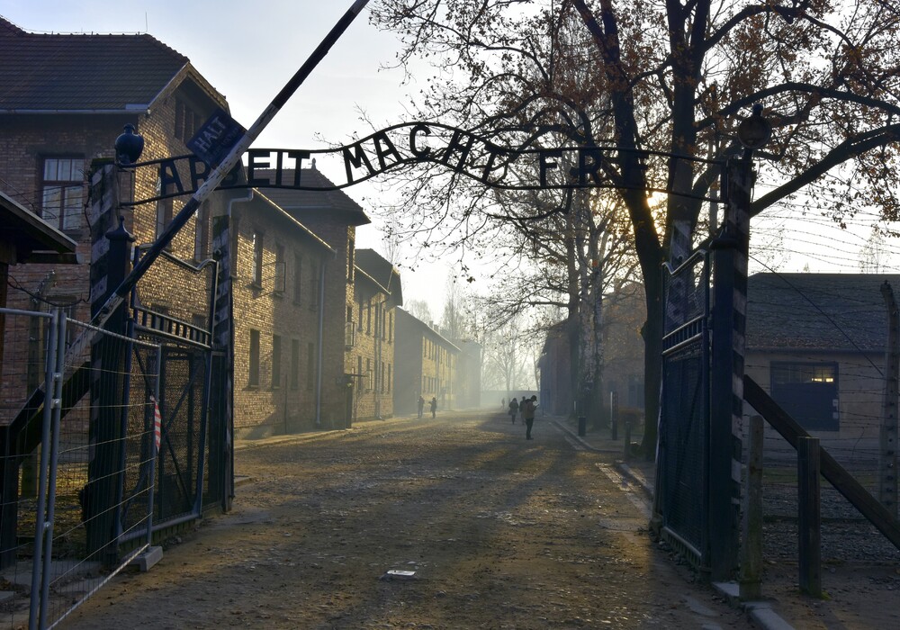 Auschwitz-Birkenau German concentration camp: the main gate bearing the inscription ‘Arbeit macht frei’