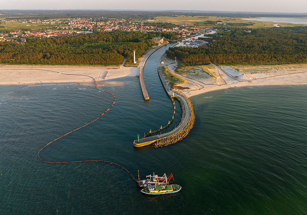 The mouth of the River Łeba flowing into the Baltic Sea near Łeba